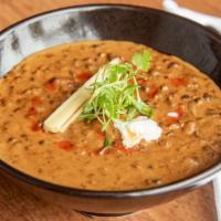 Maa Ki Daal  · Creamy black lentils slowly simmered for 48 hours with various spices
