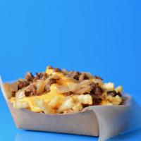 Fatties Philly Cheesesteak Fries · Crinkle cut fries topped with melted American cheese sauce, Philly steak, and grilled onions.