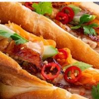 B5-Pork Belly Banh Mi · Pork Belly with daikon, cucumber, green onion and cilantro, jalapeno top with light soy sauc...
