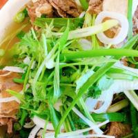 Beef Rib Pho- Pho Xuong Bo · Beef Rib Pho in spicy broth, served with rice noodle.