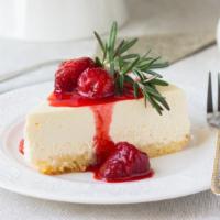 Strawberry Cheesecake · Satisfying and silky New York cheesecake crowned with wild strawberries.