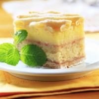 Tres Leches Cake · Classic sponge cake soaked with three types of milk and decorated with whipped cream.