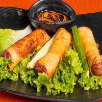 Egg Rolls · Three egg rolls with shrimp, pork, taro, glass noodle, shredded carrot & wood-ear mushroom.