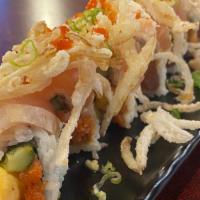 Albacore Dream Roll · Spicy tuna, cucumber, shrimp tempura, avocado. On top - cajun albacore with garlic ponzu sau...