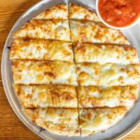 Garlic Sticks (10) · Pizza dough topped with garlic butter and parmesan cheese, add mozzarella. Cheese upon reque...