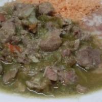 Chile Verde  · chunks of pork,
choose from corn or flour tortillas