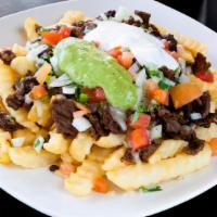 Meat Fries · Served with fries, your choice of meat, cheese, tomato, sour cream, onions, cilantro and gua...