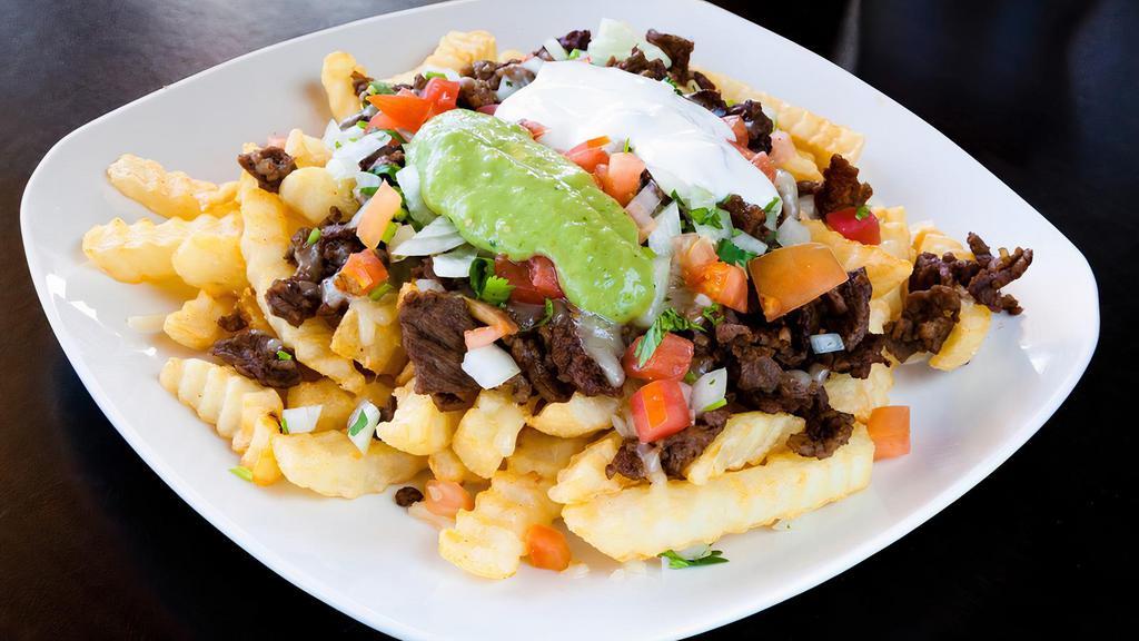 Meat Fries · Served with fries, your choice of meat, cheese, tomato, sour cream, onions, cilantro and guacamole.
