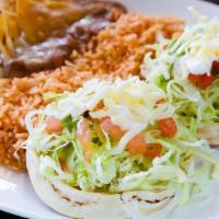 Sope Plate · Two sopes, that have beans, your choice of meat, lettuce, tomato, sour cream, guacamole, che...