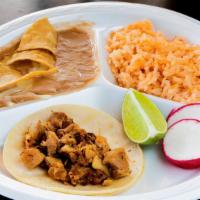 Taco Plate · One taco, rice and beans.
