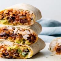 El Toro'S Cheesy Bean And Rice Burrito · A burrito filled grilled veggies, pico de gallo, rice, beans, lettuce, tomatoes, cheese and ...