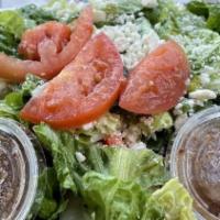 Greek Salad · Romaine lettuce, cucumbers, black olives, red onions, tomatoes & feta cheese.