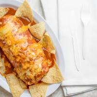 Wet Burrito · meat, rice, beans, cilantro and onion burrito covered in red sauce and topped with melted ch...