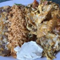 Chilaquiles · Lightly fried tortilla chips scrambled with egg and pico de gallo and then slightly simmered...
