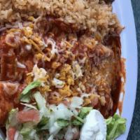 Enchiladas Combo · 2 red enchiladas with choice of (asada, chicken or cheese) Include rice and beans.