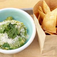 Guacamole & Chips · Grilled corn salsa, cotija(dairy), buena salt, and housemade tortilla chips.