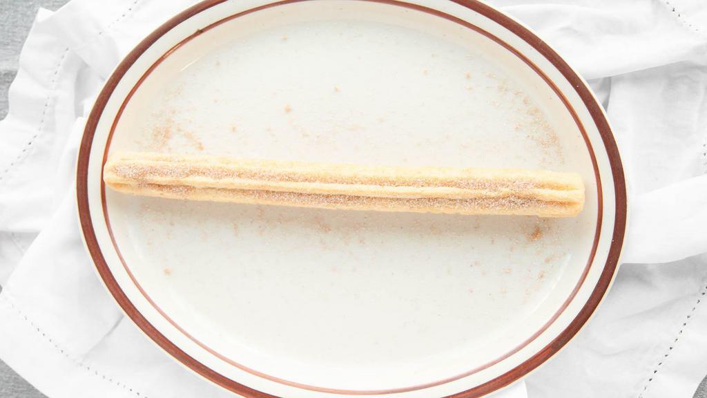 Churro · Cinnamon stick filled with Mexican style caramel.
