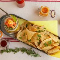 Bean Dip · Five layered Bean dip. Beans, cheese, green or red sauce, sour cream, Pico de gallo. Side of...