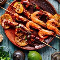 Shrimp (1 Pc) · Freshly marinated shrimp barbecue with Brazilian spices.