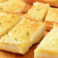 Garlic Bread · Tasty fresh bread filled with garlic sauce and baked to perfection.