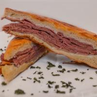 Pastrami Panini · Pastrami, house aioli, your choice of cheese mozzarella or swiss and pickles.