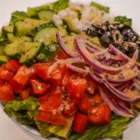 Greek Salad · Romaine lettuce, cucumber, red onion, tomato, black olives, feta cheese and lemon vinaigrett...