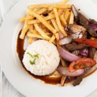 Lomo Saltado · Is a popular, traditional Peruvian dish, a stir fry that typically combines
marinated strips...
