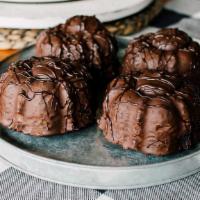 Molten Chocolate Lava Cakes - Serves 3-4 · 4 ready to bake luscious chocolate cakes filled with a dark chocolate truffle. Serve decaden...