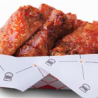 Chicken Wings 24 Pcs · Lightly breaded chicken wings with a choice of sweet crunchy chili sauce, buffalo and bbq sa...