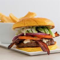 Black And Blue Burger · Bacon, blue cheese crumble, avocado, tomato, and red onion with blue cheese dressing on a ch...