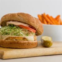 Veggie Burger · Garden patty, Jack cheese, tomato, alfalfa sprouts and Russian dressing on a whole wheat bun.