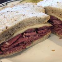 #10 Hot Pastrami Sandwich · Pastrami, Swiss cheese and Russian Dressing on double-baked rye bread.