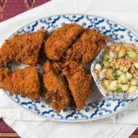 2437. Angel Wings · Deep fried boneless chicken wings stuffed with minced chicken, pork, onions, carrots, mushro...