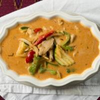 2463. Panang Curry · Served with spicy. Chef special red curry paste in coconut milk with bell pepper, bamboo, an...