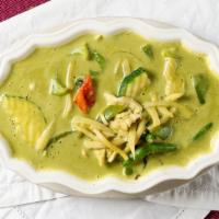 2462. Green Curry · Served with spicy. Green chili paste curry in coconut milk with bamboo shoots, zucchini, bel...