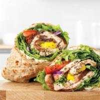 Creamy Mediterranean Wrap · Slow-roasted chicken breast with cool and creamy tzatziki sauce, banana peppers, green leaf ...