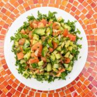 Armenian Salad · Vegetarian. Finely chopped tomato, cucumbers, onions and parsley with lemon juice, olive oil...