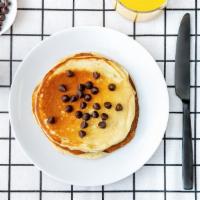 Labc Chocolate Pancakes · Two fluffy pancakes with chocolate chips served with a side of butter and syrup. Done right.