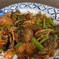 Catfish With Chili Sauce · Spicy. Deep fried catfish stir-fried with chili paste, basil leaves, young green pepper and ...