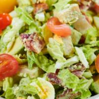 Cobb Salad · Gluten-Free. Bacon • eggs • tomatoes • smoked turkey • Gorgonzola • avocadoes • red onions •...