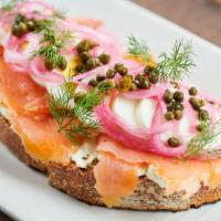 Smoked Salmon · Hot. Smoked salmon, egg, pickled onion, capers, jalapeño cream cheese, dill.