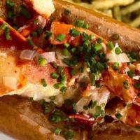 Maine Lobster Roll · Lemon Tarragon Aioli, Buttered Brioche & Romaine with Housemade Chips.