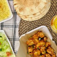 Family Meal - Serves Up To 4 · Family Meal includes: 20 pieces of chicken kebab, salad, rice, hummus, and pita bread for 4....