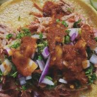 Large Carnitas Taco · Fresh corn tortilla, carnitas, cilantro, cebolla, lime, salsa on the side.