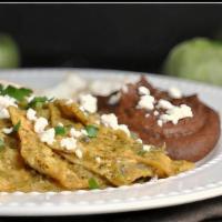Chilaquiles Verdes  · Chilaquiles, cheese, Onion, cilantro, eggs, rice, beans.
