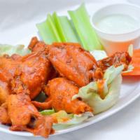 Hot Wings · Chicken wings fried to perfection and tossed with our signature hot & tangy wing sauce. Serv...