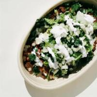 Classic Bowl · Red rice, pinto beans, your choice of meat and salsa, shredded romaine lettuce, cilantro, di...