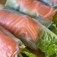 Salmon Garden Rolls · Gluten free. Raw salmon, rice paper wrap, basil, mint, lettuce, cucumber, carrot with garlic...