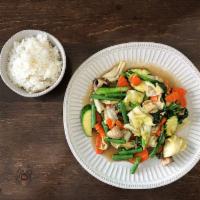 Pad Pak · Vegan. Chinese broccoli, carrot, green bean, mushroom, cabbage, zucchini, garlic, white rice.