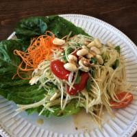 Papaya Salad · Gluten free. Medium spicy. Papaya, green bean, garlic, tomato, peanut, dried shrimp, chili, ...